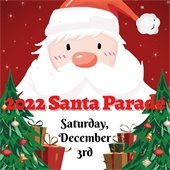 A cartoon Santa is behind two Christmas trees with gifts. Text reads "2022 Santa Parade - Saturday, December 3rd."