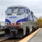 A photo of a Metra train on the tracks