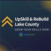 The background is navy blue with gold accents. A logo with two gold arrows pointing upwards is left of center. The center text reads "UpSkill and Rebuild Lake County - grow your skills now!"