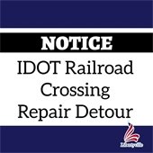 A dark blue background has a white square in the center. In a black bar is text that reads "Notice." Text in the white box says "IDOT Railroad Crossing Repair Detour."