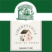 The background is dark green. In the center is a beige square with a pink and brown house that reads "Libertyville Tour of Homes - September 17th, 2022." At the top is a green logo with an old estate that says "MainStreet Libertyville Illinois."