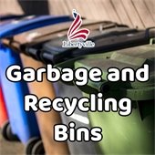 A row of multicolored refuse bins are in front of a fence. Text reads "Garbage and Recycling Bins."