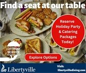 A spread of sandwiches and food on a table with text that says "Reserve holiday party and catering packages today!"