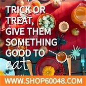 The background is a table covered in Halloween-themed snacks and decorations. Text reads, "Trick or treat, give them something good to eat - www.Shop60048.com."