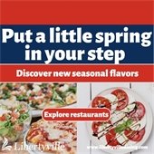 Two photos are at the bottom showcasing dishes with fresh herbs. Text reads "Put a little spring in your step - discover new seasonal flavors. www.LibertyvilleDining.com"