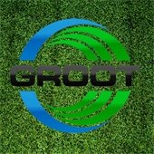A background of grass with a logo for Groot, large black text within a waving green and blue circle.