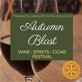 The background is several wine glasses, one of which is filled with red wine. In the center is a forest green box with text that reads "Autumn Blast Wine Spirits Cigar Festival."