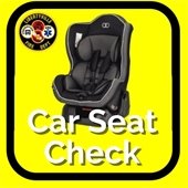 The background in yellow. There is a black rounded outline. Inside the outline is a fire department logo in the top left corner with a child's car seat in the center. Beneath is white text with a gray shadow that reads "Car Seat Check."