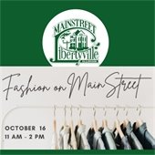 The background is dark green. A taupe rectangle show clothing hanging on a rack with text that says "Fashion on MainStreet - October 16 - 11 am to 2 pm." At the top center is a white circle with a green logo showcasing a vintage home that says "Mainstreet Libertyville Illinois."