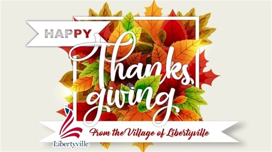 An array of orange, red, and green leaves sit behind script that says "Happy Thanksgiving from the Village of Libertyville."