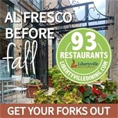 A photo of an outdoor dining area with flowers has text that reads "Al fresco before fall - 93 restaurants, www.LibertyvilleDining.com."