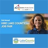 The background is a medium blue with a photo of a woman smiling in the center right. Text reads "2nd Annual Hire Lake County Job Fair." A logo at the top is a white rectangle and reads "Job Center of Lake County." A logo at the bottom with a white background says "Lake County Workforce Development" in green and blue.