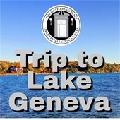 "Trip to Lake Geneva" is in light grey, bold letters with a dark shadow. The background is a photo of Lake Geneva, Wisconsin, showcasing both the water and sky.