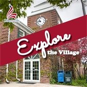 A photo of the Village Hall is covered by a ruby ribbon that reads "Explore the Village" in bolded white font.