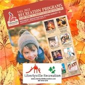 The background is a design of red, orange, and yellow leaves. In the center is the cover of a fall-themed enrollment guide. At the bottom is a white rectangle with a logo of shapes of playground equipment and trees and text that says "Libertyville Recreation."